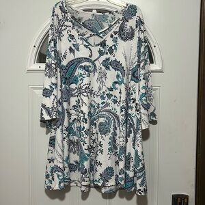 Blue paisley tunic. Flair at the bottom.